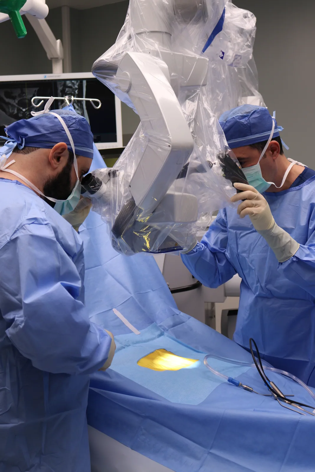 Dr. Yasmeh performing robotic-assisted spine surgery